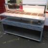 New/Unused (Manufactured July 2017) TFSE Products Ltd, Café Counter Heated Wet Well Bain Marie Servery. Model SM1750-740BM.Quartz Heat Lit Gantry with Toughened Glass Screen Top, Front & Sides. Stainless Steel Construction with Red Laminate Fascia. Size H - 6