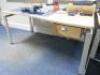 Quantity of Assorted Office Furniture to Include: 1 x Reception Counter, 7 x Wave Desks, 6 x Pedestals, 7 x 4 Drawer Filing Cabinets, 1 x Executive Office Suite, 1 x Book Case & 1 x Nobo Projector Trolley (As Viewed/Pictured). - 8