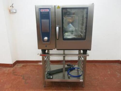 Rational Self Cooking Centre 6 Rack Electric Combi Oven, Model SCCWE61E, S/N E61SI19052747573,DOM 05/2019. Comes with Stainless Steel Combi Stand with Tray Slides and Instruction Manual.