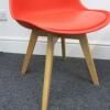 Pair of Habitat Jerry 120858 Dining Chairs in Molded Plastic with an Upholstered Seat Pad and Solid Oak Legs. Colour Red - 4