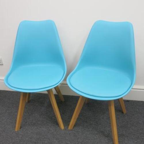 Pair of Habitat Jerry 120858 Dining Chairs in Molded Plastic with an Upholstered Seat Pad and Solid Oak Legs. Colour Turquoise