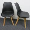 Pair of Habitat Jerry 120858 Dining Chairs in Molded Plastic with an Upholstered Seat Pad and Solid Oak Legs. Colour Black - 2