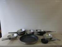 18 x Assorted Sized Frying Pans to Include: 1 x D47cm, 2 x D32cm, 1 x D29cm, 4 X 28cm, 5 x D26cm, 3x D25cm, 2 x D16cm