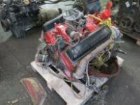 V8 Naturally Aspirated Engine Painted Red with Fitted Carburetor, Coil & Ancillaries, Bell Housing, Gearbox, Fly Wheel & Clutch Assembly, No ECG 9425H. (As Viewed and Inspected. For Spares or Repair).
