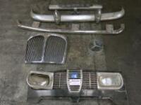 6 x Assorted Car Parts to Include: Bumper, Bumper Bar, Step, Chrome Grill, Mercedes Logo & Saab Front Grill with Lights.