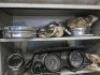 Cabinet Containing Approx 30 x Assorted Car Parts to Include: Steering Racks, Light Surrounds, Chrome Steering Column (New/Boxed), Brake Drums, Front Discs & Other Parts: NOTE: parts believed to be Ford Mustang but not guaranteed. - 7