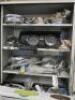 Cabinet Containing Approx 30 x Assorted Car Parts to Include: Steering Racks, Light Surrounds, Chrome Steering Column (New/Boxed), Brake Drums, Front Discs & Other Parts: NOTE: parts believed to be Ford Mustang but not guaranteed. - 8
