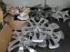 Approximately 60 x Assorted Sized Wheel Spinners & Embellishers.