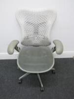 Herman Miller Mirra Ergonomic Adjustable Office Chair in Light Grey with Adjustable Arm Rests & Vinyl Arm Caps.