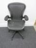 Herman Miller Aeron Ergonomic Adjustable Mesh Office Chairwith Adjustable Arm Rests & Fabric Arm Caps.Size B.NOTE: seat pan requires refurbishment (As Viewed/Pictured).&nbsp;