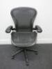 Herman Miller Aeron Ergonomic Adjustable Mesh Office Chairwith Lumbar Support, Adjustable Arm Rests & Vinyl Arm Caps.Size B.NOTE: seat pan requires refurbishment (As Pictured/Viewed).&nbsp;