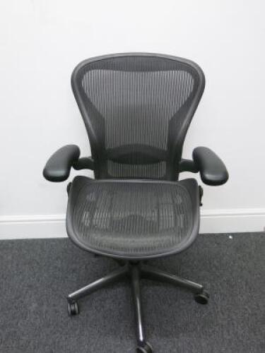 Herman Miller Aeron Ergonomic Adjustable Mesh Office Chair with Lumbar Support, Adjustable Arm Rests & Vinyl Arm Caps.