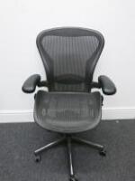 Herman Miller Aeron Ergonomic Adjustable Mesh Office Chair with Lumbar Support, Adjustable Arm Rests & Vinyl Arm Caps.