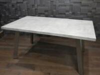 Extending Stone Effect Dining Table on Metal Polished Legs. Size H76cm x W160cm x D90cm (Extending to 220cm).