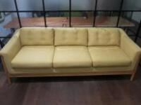 3 Seater Sofa Upholstered in Mustard Fabric with Button Detail to Cushions on Wooden Frame & Legs. Size H75cm x W220cm x D90cm.