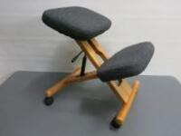 Office Furniture Designer Kneeling Chair with Wooden Frame & Upholstered in Blue Hopsack Material.
