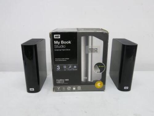 3 x Western Digital Eternal Hard Drives to Include: 2 x My Book Essential (3TB & 2TB) & 1 x My Book Studio (2TB) in Box. Comes with 1 x Power Supply.