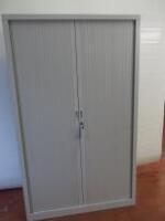 Metal Light Grey 4 Shelf 2 Door Tambour Cupboard with keys. Size H198cm x W120cm x D43cm.