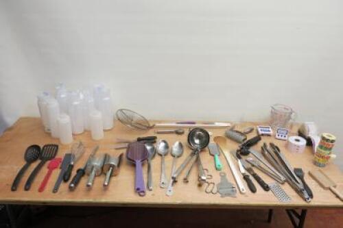 Approx 60 Items of Kitchen Utensils to Include: Pyrex Measuring Jugs, Clear Sauce Bottles, Spatulas, Whisk, Knife Sharpener, Flour Scoop, Ladles, Spoons, Cheese Grater, Tongs, Count Down Timers, Pastry Cutters, Can Opener, Pastry Roller & Selection of Lab