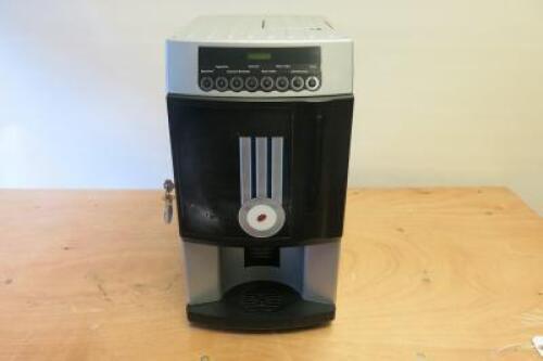 Rheavendors Italian Made Commercial Table Top Bean To Cup Coffee Machine, Model XXOC, Serial Number 2016 03 02645. Comes with Key & Power Supply. NOTE: Spares or Repair (As Viewed/Pictured).