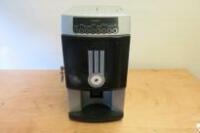 Rheavendors Italian Made Commercial Table Top Bean To Cup Coffee Machine, Model XXOC, Serial Number 2016 03 02645. Comes with Key & Power Supply. NOTE: Spares or Repair (As Viewed/Pictured).