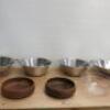 Assortment of Colanders, Mixing Bowls & Wooden Fruit Bowls. Size 2 x 39cm, 2 x 35cm & 2 x 24 cm.As Viewed/Pictured.   - 3