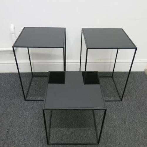 Set of 3 Black Assorted Sized Metal Framed Display Tables with Black Glass Insert to Include 2 x H65cm x W43cm x D43cm & 1 x H45cm x W43cm x D43cm.