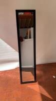 Free Standing Mirror Finished in a Wooden Black Gloss Frame with Adjustable Metal Support Legs. Size H160cm x W37.5cm x D3cm.
