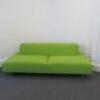 Lime Green Upholstered 2 Seater Settee on Metal Framed Legs with 2 Green Cushions. Size H64cm x W220cm x D100cm