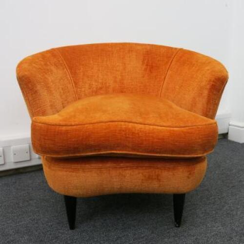 Burnt Orange Upholstered Lounge Chair on Black Legs. H69cm x W80cm x D69cm.