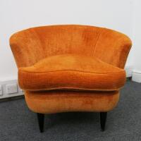 Burnt Orange Upholstered Lounge Chair on Black Legs. H69cm x W80cm x D69cm.