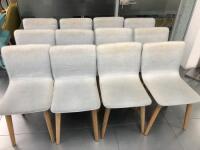 12 x Light Green/Blue Material Chairs on Light Wood Legs. Size H82cm (Require Cleaning).