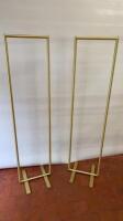 Pair of Gold Effect Metal Clothes Rail. Size H152cm x W38cm x D20cm.