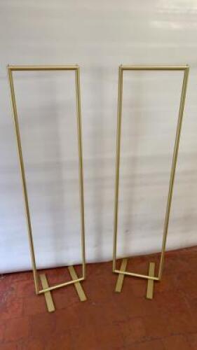 Pair of Gold Effect Metal Clothes Rail. Size H152cm x W38cm x D20cm.
