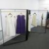 Black Tri Folding, Commercial Shop Display Iron Clothes Rail with Gold Coloured Hanging Bar. Size H160 x W115 x D9cm. Approx Overall Length 3.5m. NOTE: Un-assembled for collection and clothes rails are extremely heavy - 3