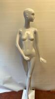 Schlappi Female Full Bodied Abstract Sideward Facing White Gloss Mannequin with Shoulder & Hand Joints. Comes with Heavy Metal Base.