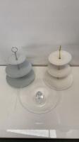 3 x Assorted Cake Stands to Include: 2 x 3 Tier Porcelain Cake Stand & 1 x Boxed Glass Cake Stand.