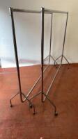 Pair of Mobile Clothes Rails on Castors. Size H157cm x W180cm. NOTE: missing 1 set of castors.