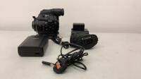 Canon EOS C300 PL Camcorder Body, S/n 543671200011. Comes with Canon Grip, Canon Compact Power Adapter, Model CA-941, Canon Battery Charger, Model CG940 & 1 x Canon Battery Pack, Model BP-955. 