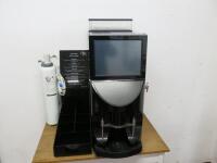 Aequator Bean to Cup Coffee Vending Machine, Model Brasil Touch II, S/N 6631808017, 240v. Comes with Rijo 42 Water Filtration,Tea/Coffe Plastic Display, Power Supply & 2Keys.