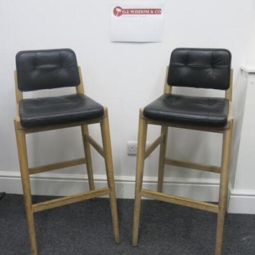 Pair of Neri & Hu Designed Capo High Bar Stools, Manufactured In Portugal by De-La-Espada. American White Oak Frame and Upholstered in Black Leather with Black Leather Back. Size H115cm. RRP £3610.00