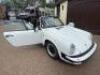 FLE 31Y: (1983) Porsche 911, 3.0 litre, 2 Door Convertible in White with Red Leather Interior..... - 24