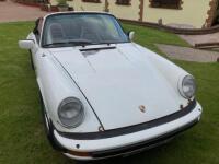 FLE 31Y: (1983) Porsche 911, 3.0 litre, 2 Door Convertible in White with Red Leather Interior.....