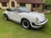 FLE 31Y: (1983) Porsche 911, 3.0 litre, 2 Door Convertible in White with Red Leather Interior..... - 3