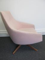 Montis Low Swivel Chair, Upholstered in Divina MD Pink Fabric with Button Back Detail. Size (H)90cm x (W)75cm.