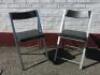 Pair of Grey Metal Folding Chairs with Black Faux Leather Seat.&nbsp;