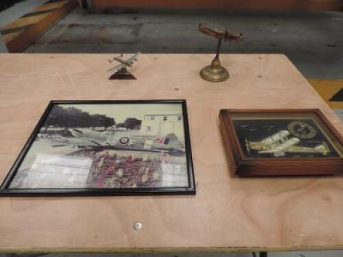 Plane Memorabilia to Include; 1 x Spitfire Model, 1 x Lancaster Bomber 1 x Spitfire Framed Picture & 1 x Classic Plane Clock.  