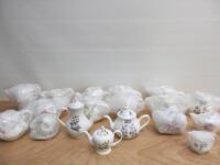 52 x Items of Bone China Floral Designed Coffee Pots, Tea Pots, Milk Jugs & Sugar Bowls (As Viewed/Pictured).