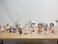 25 x Items of Souvenir & Collectible Ceramics to Include: 3 x Royal Dux Figurines, 3 x Small Toby Jugs, 2 x James Sadler Policeman, 2 x James Sadler Jars with Lids, 1 x Royal Doulton Clock, 1 x Westclox Carriage Clock, 1 x Royal Albert Vase, 1 x Royal Alb