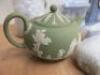 31 x Items of Wedgewood Collectibles to Include: 1 x Large Blue Teapot, 1 x Small Blue Teapot, 1 x Limited Edition Wedding Anniversary Cup, 1 x Blue Ice Bucket, 1 x Blue Sugar Bowl, 2 x Blue Clocks, 2 x Lighters, 1 x Green Teapot, 1 x Green Milk Jug, 5 x - 3